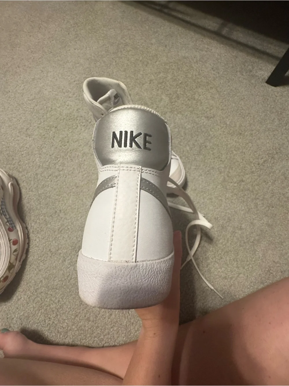 Nike White High-Top Sneakers with silver Accents